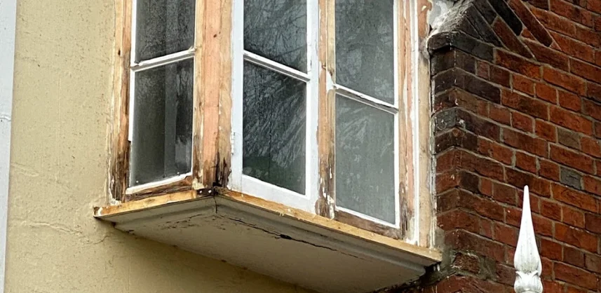 Partially decayed wooden window frame — Epsom repair