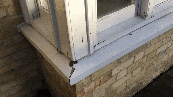 Sash window before restoration Leatherhead