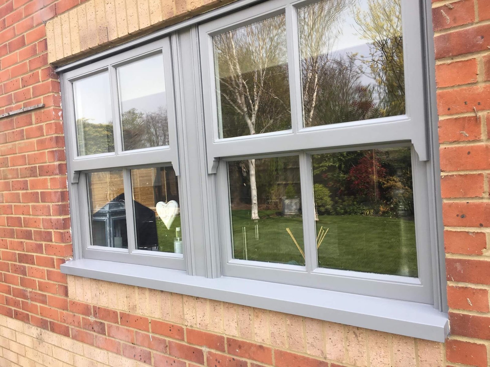 Window painting — painting a wooden sash window in Surrey